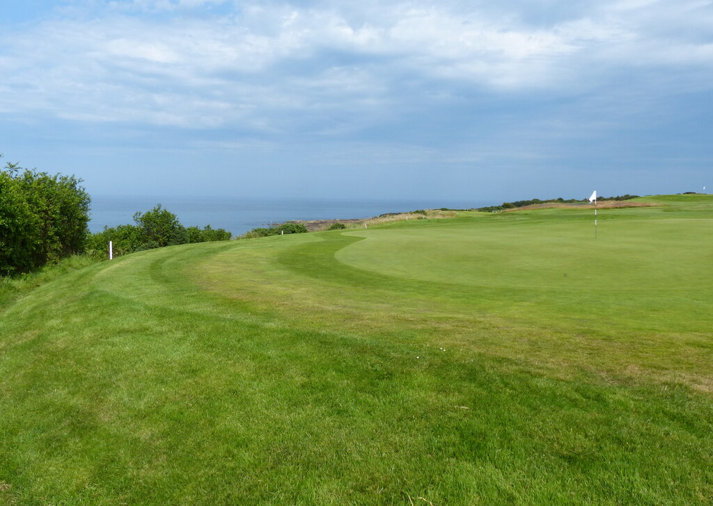 A green on the Torrance Golf Course near St Andrews, with the sea beyond